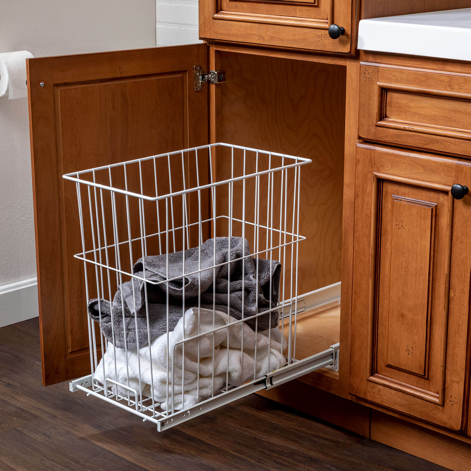 Bathroom vanity hamper storage.