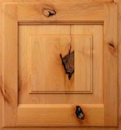 A cabinet door with natural rustic alder wood material for kitchen and bath cabinets.