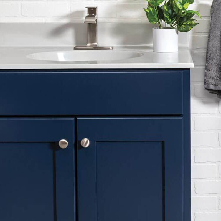 A close up of a Blue bathroom vanity.