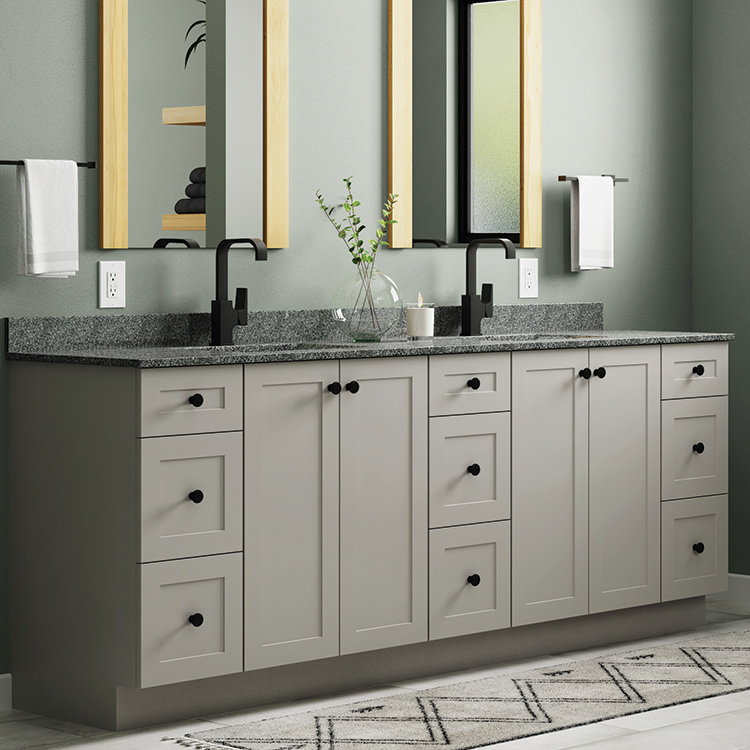 A double sink vanity with modern transitional styling and shaker cabinet doors.