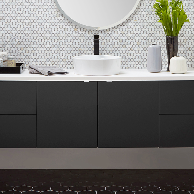 Black cabinetry is trending for bathroom vanities.