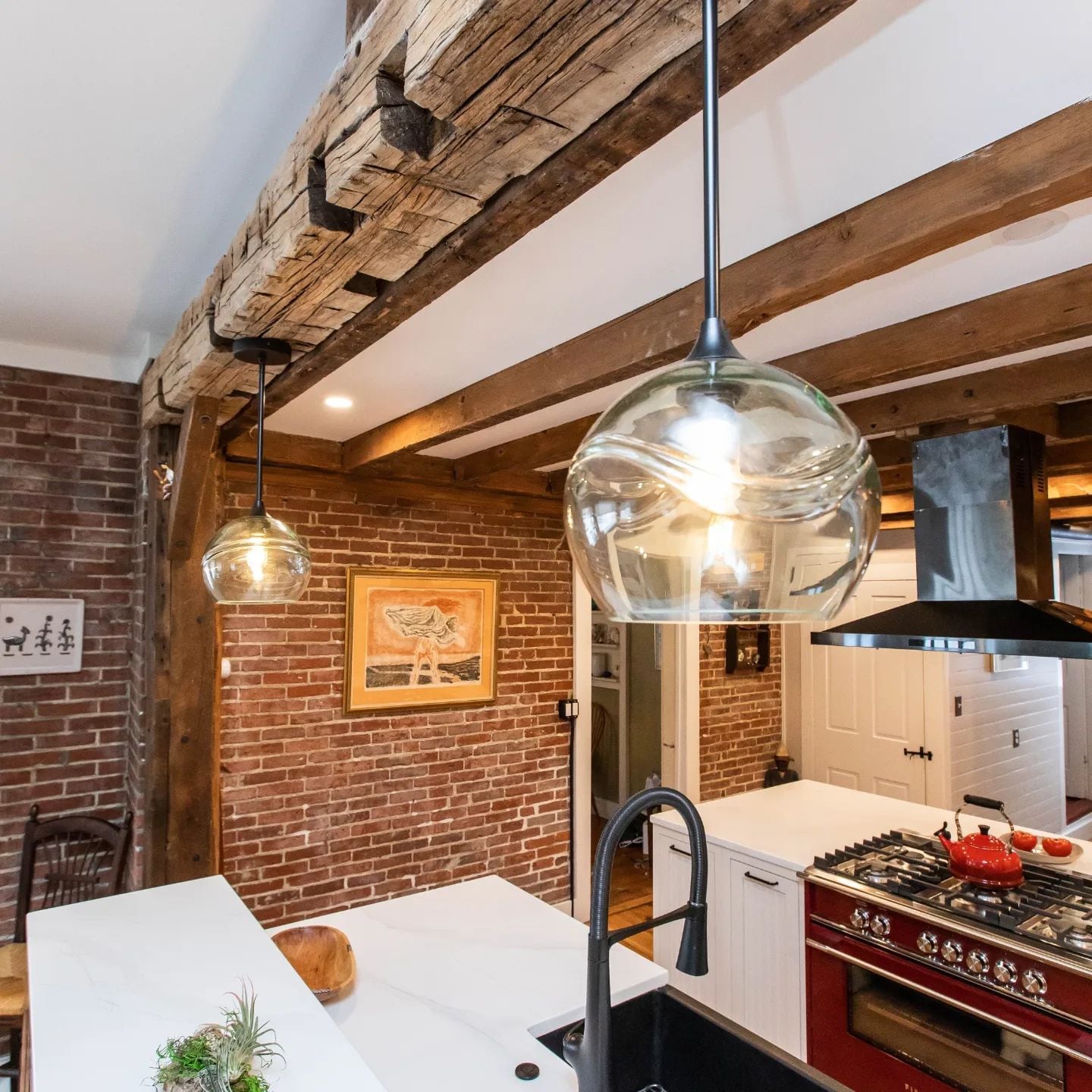 A rustic kitchen design with double kitchen islands.