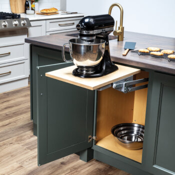 Heavy kitchen appliances can be lifted with ease to countertop level and conveniently stored with a Base Mixer Cabinet from Bertch.