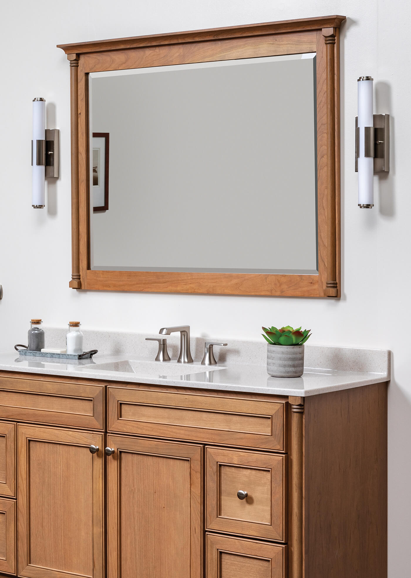 Architectural framed mirror and matching vanity.