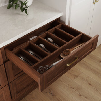 Keep your cutlery collection organized with this sturdy addition to your solid wood drawer box by Bertch Cabinet shown in Walnut.