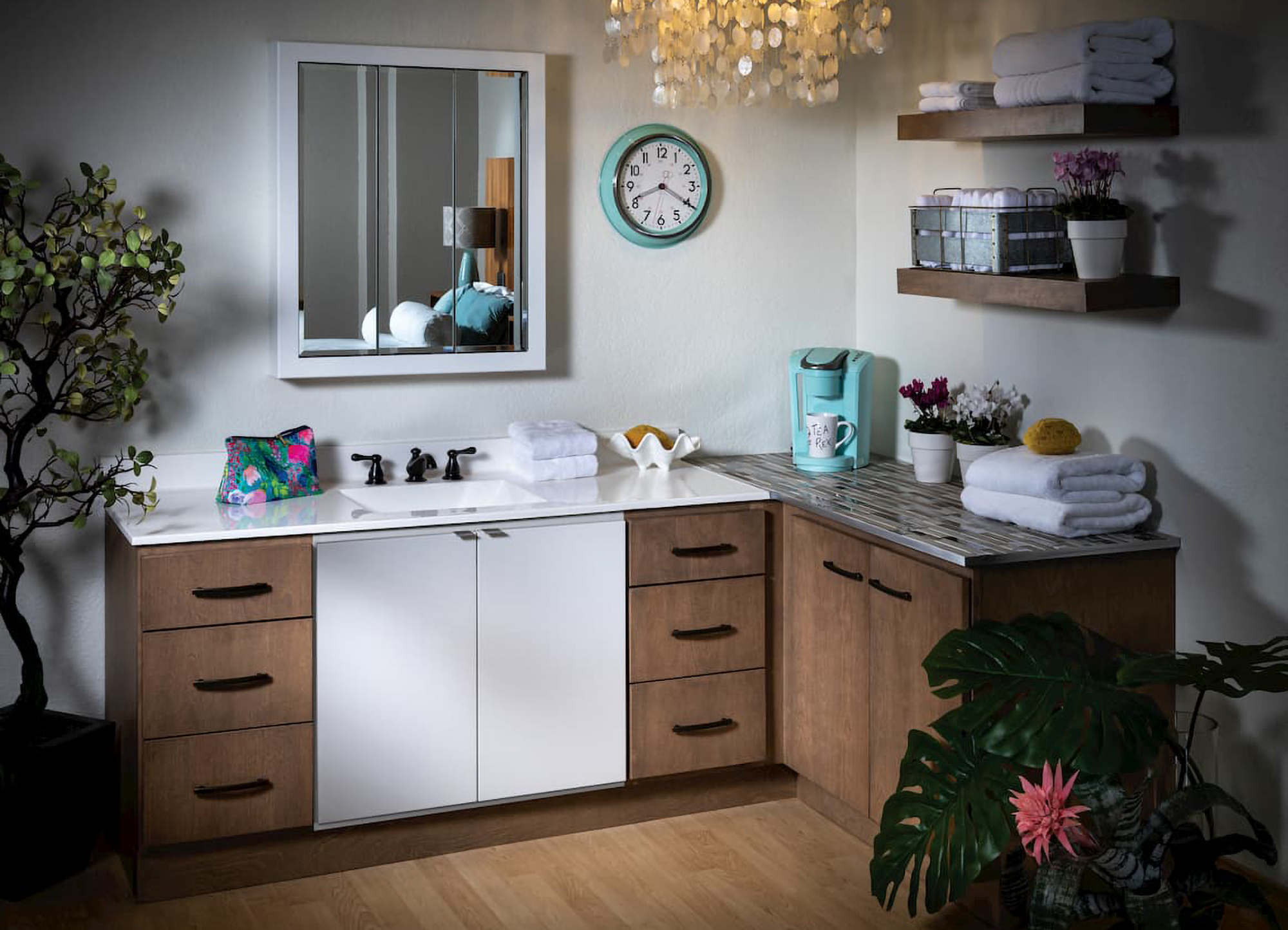 An organized bathroom with thoughtful cabinet storage.