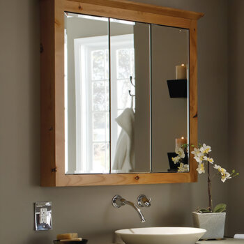 This three mirrored bathroom storage mirror provides a broad panoramic view idea for grooming and personal care.