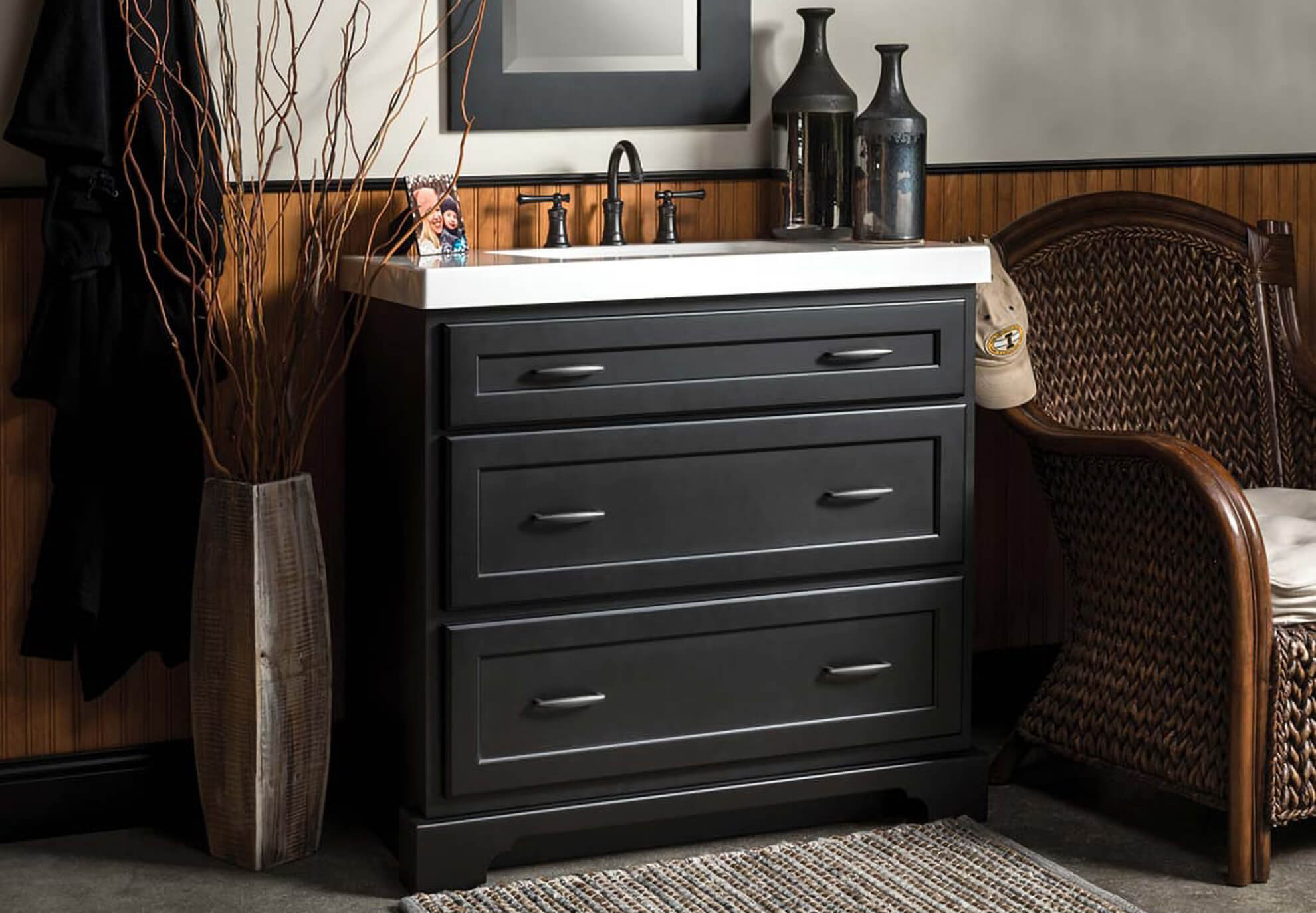 Black dresser style bathroom vanity.