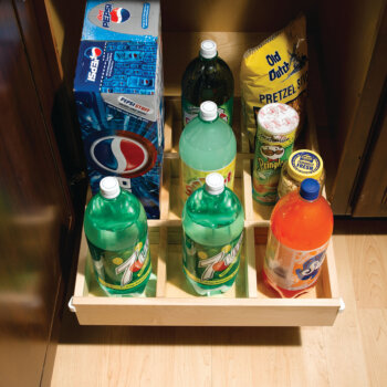 This roll-out tray with divided storage for beverage & pantry items is an ideal accessory for a beverage center, pantry, or wet bar.