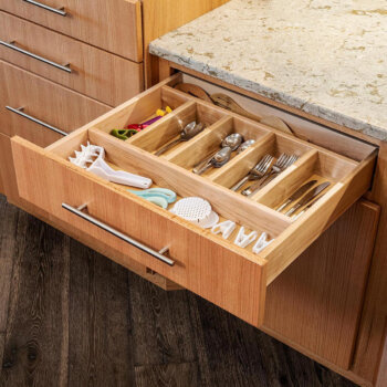 Keep your cutlery collection organized with this sturdy addition to your solid wood drawer box by Bertch Cabinet.