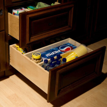 Drawers outfitted with dividers can create the perfect customizable storage for your pantry goods, bakeware, cookware, and more.