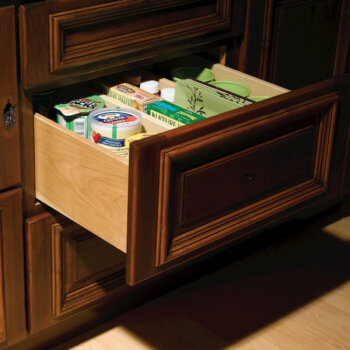 Drawers outfitted with dividers can create the perfect customizable storage for your pantry goods, bakeware, cookware, and more.