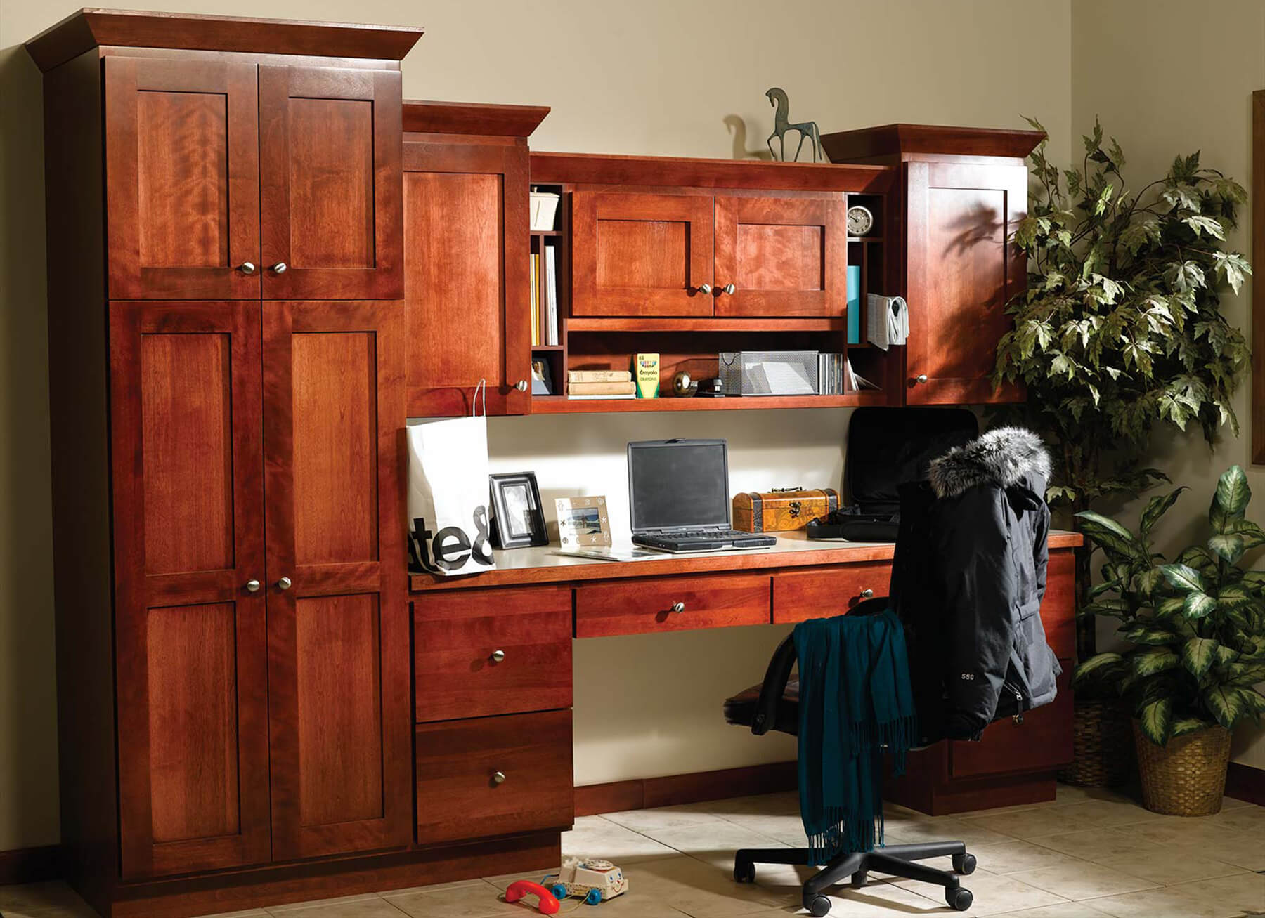 Traditional home office cabinets with a classic Craftsmen style.