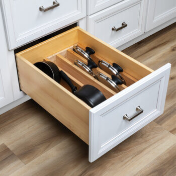 A Bertch lid Storage Insert helps keep lids for containers, pans, and other items organized in neat vertical stacks. Shown here with pots and lid storage for pots.