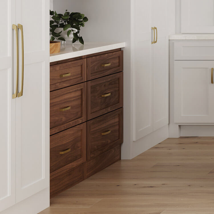 White flat panel kitchen with natural walnut drawer stacks