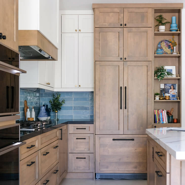 Beautiful tall storage with open shelves and two tone kitchen